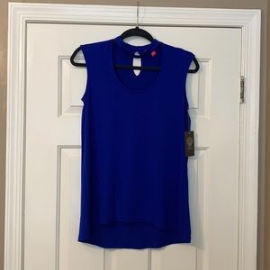 Vince Camuto long sleeveless mockneck blouse.